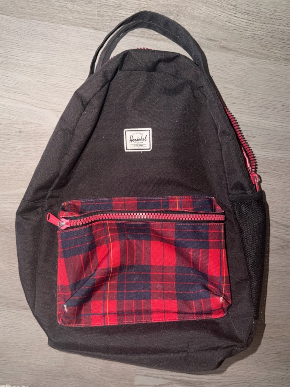 Herschel Supply Co. Black Backpack with Red Plaid Front Pocket